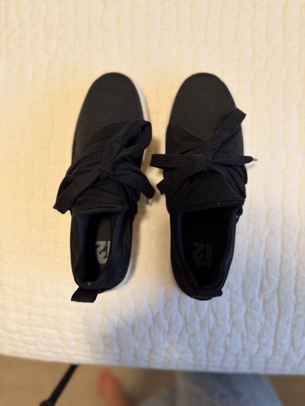 Lucy Black Knit Shoe with Bow Accent